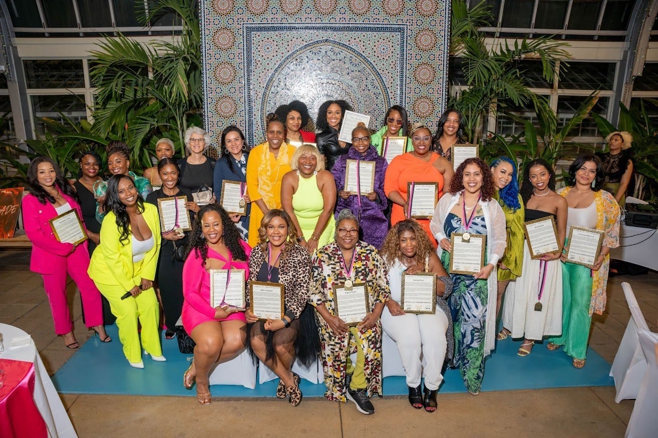 WEMADE Honorees posing with their awards alongside WGCI Radio Personality and host Bree Specific and Co-Founders of WEMADE Briahna Gatling and Carol Johnson
